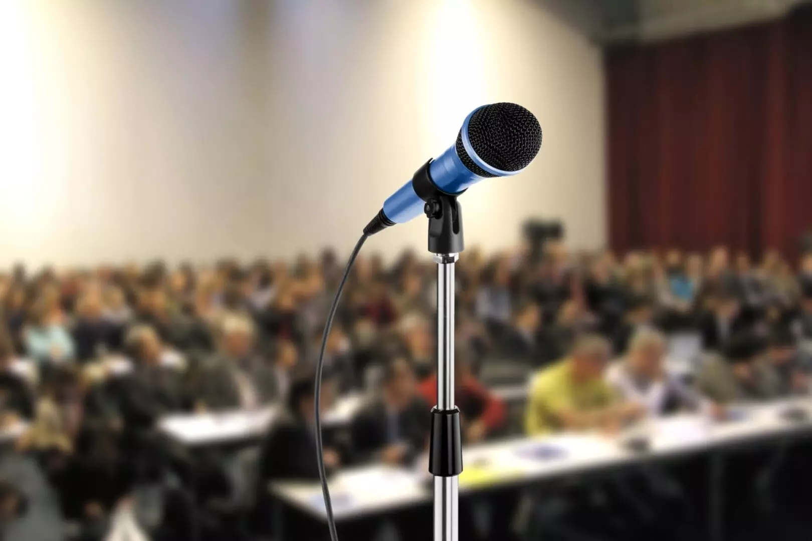 Image of microphone during seminar in a hall